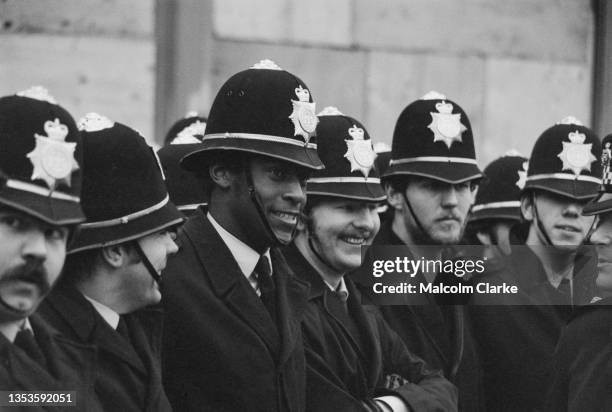 Police supervising a protest against the National Front, far-right fascist political party, in Birmingham, UK, 20th February 1977.