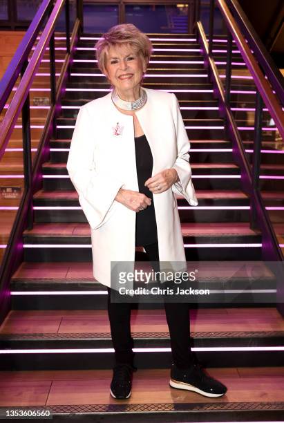 Gloria Hunniford poses for a photograph after accepting a cheque for £26,000 from the Hard Rock Cafe in donation to The Caron Keating Foundation...