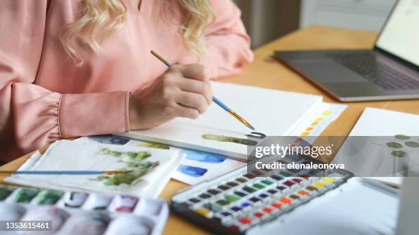 woman artist at work - artists palette stock pictures, royalty-free photos & images