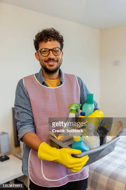 responsible for the hotel cleaning - cleaner man uniform stock pictures, royalty-free photos & images