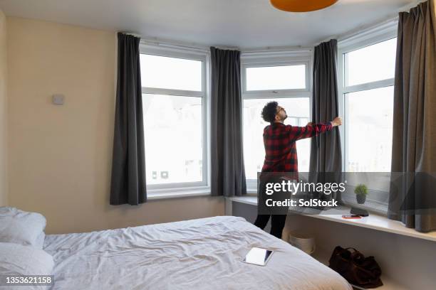 inspecting his hotel room - guest bedroom stock pictures, royalty-free photos & images