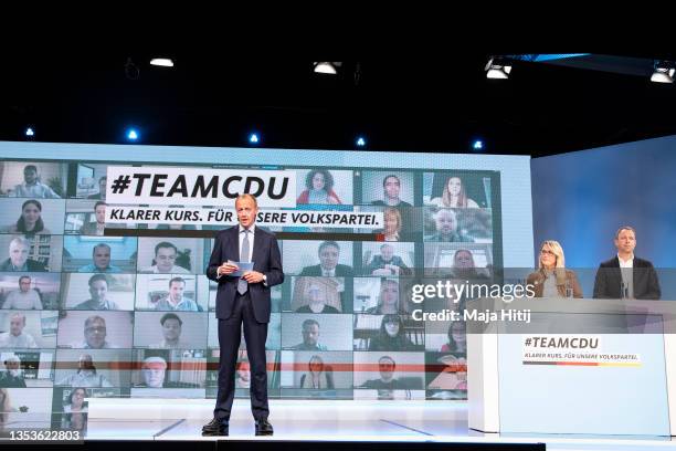 German Christian Democrat Friedrich Merz speaks alongside Christina Stumpp , member of the Bundestag, and Mario Czaja , former Berlin Senator for...