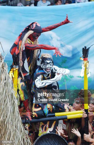 Youths participant in the Kadayawan sa Dabaw Festival performing a street dance telling a story of myth and legend of one of the tribes, mostly...