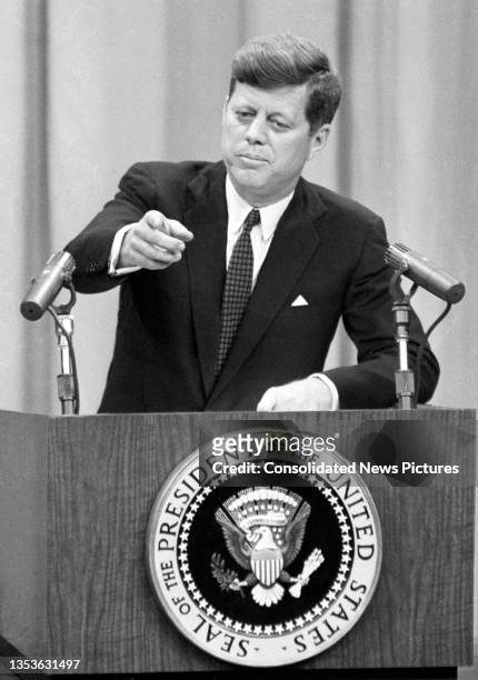 President John F Kennedy conducts a press conference in the State Department Auditorium, Washington DC, March 1, 1961.