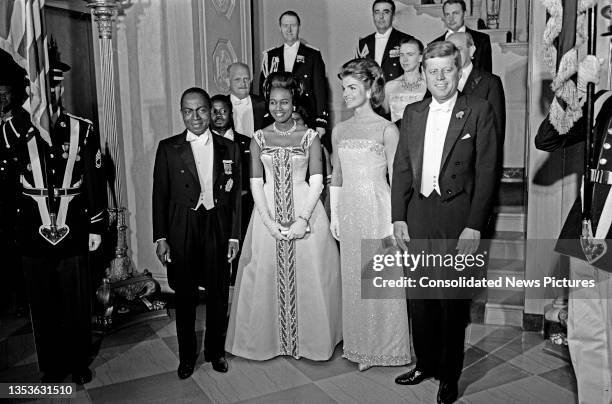 View of, fore from left, married couples Ivory Coast President Felix Houphouet-Boigny and Marie-Therese Houphouet-Boigny & First Lady Jacqueline...