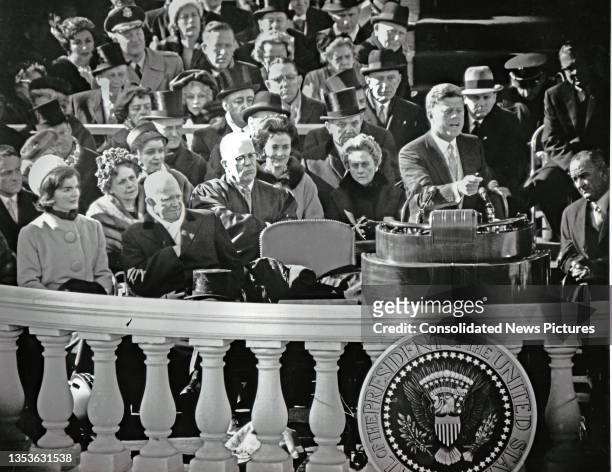 President John F Kennedy delivers his Inaugural Address from the US Capitol's East Front, Washington DC, January 20, 1961. Among those visible behind...