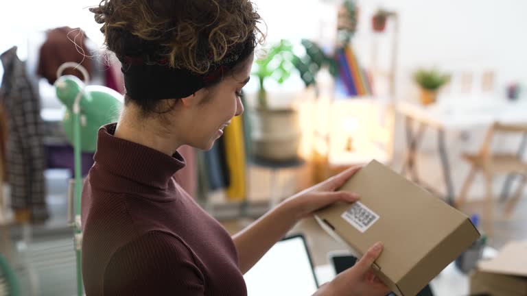 Label Owner Putting Shipping Label On Box Videos and HD Footage - Getty Images