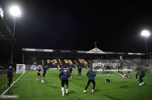 Notts County warm up prior to the Emirates FA Cup First Round Replay match between Notts County and Rochdale at Meadow Lane on November 16, 2021 in...