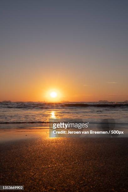 scenic view of sea against clear sky during sunset,meijendel,wassenaar,netherlands - netherlands sunset foto e immagini stock