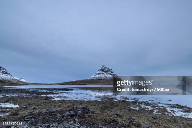 scenic view of snowcapped mountain against sky,iceland - landslag imagens e fotografias de stock