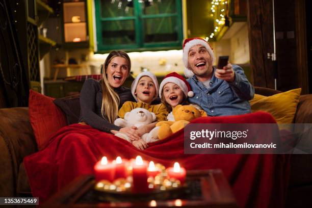 christmas isn't complete without a fun movie marathon - image type stock pictures, royalty-free photos & images