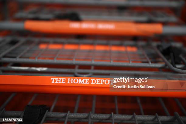 The Home Depot logo is displayed on a shopping cart outside of a store on November 16, 2021 in Vallejo, California. Home Depot announced third...