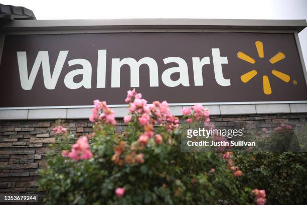 Sign is posted in front of a Walmart store on November 16, 2021 in American Canyon, California. Walmart reported better-than-expected third quarter...