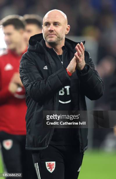 Rob Page, Manager of Wales acknowledges the fans as he celebrates their side's progression in the World Cup qualifying campaign after the 2022 FIFA...