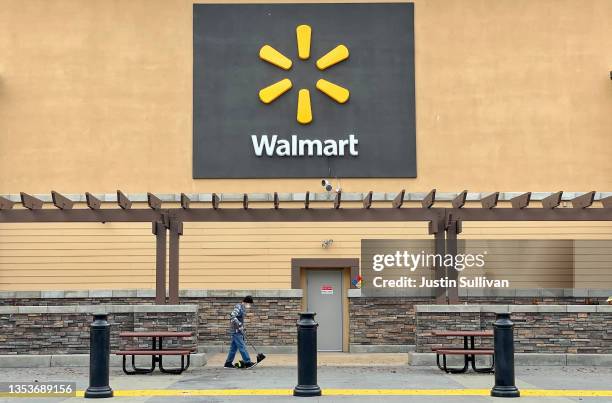 Sign is posted in front of a Walmart store on November 16, 2021 in American Canyon, California. Walmart reported better-than-expected third quarter...