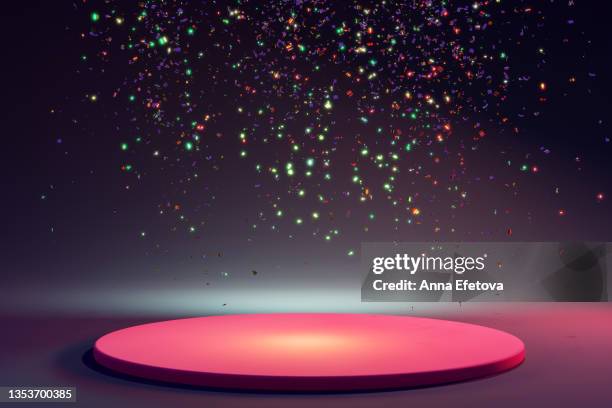 round pink ceramic podium on purple background with many falling multicolored confetti. perfect platform for showing your products. three dimensional illustration - stage light foto e immagini stock