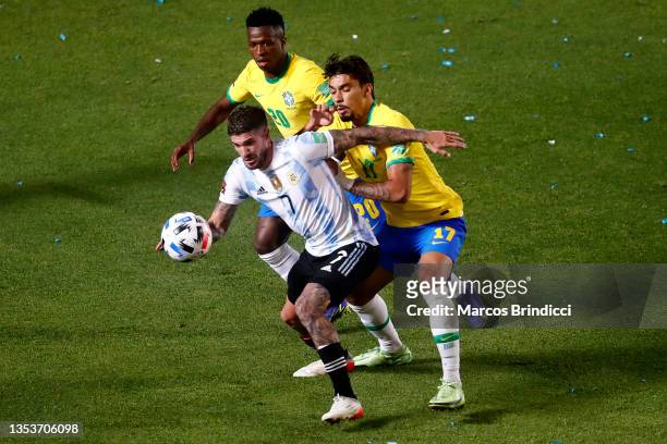 Rodrigo De Paul of Argentina competes for the ball with Lucas Paquetá of Brazil during a match between Argentina and Brazil as part of FIFA World Cup...