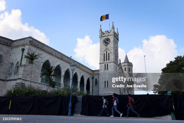 The Barbados flag flies above the parliament buildings on November 16, 2021 in Bridgetown, Barbados. The buildings were built between 1870 and 1874....