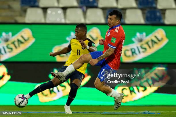 Carlos Gruezo of Ecuador and Gary Medel of Chile fight for the ball during a match between Chile and Ecuador as part of FIFA World Cup Qatar 2022...