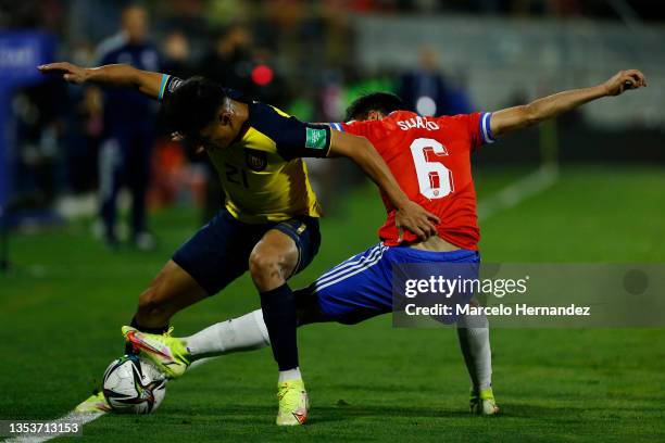 Gabriel Suazo of Chile and Alan Franco of Ecuador fight for the ball during a match between Chile and Ecuador as part of FIFA World Cup Qatar 2022...