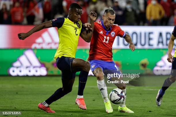 Felix Torres Caicedo of Ecuador and Eduardo Vargas of Chile fight for the ball during a match between Chile and Ecuador as part of FIFA World Cup...