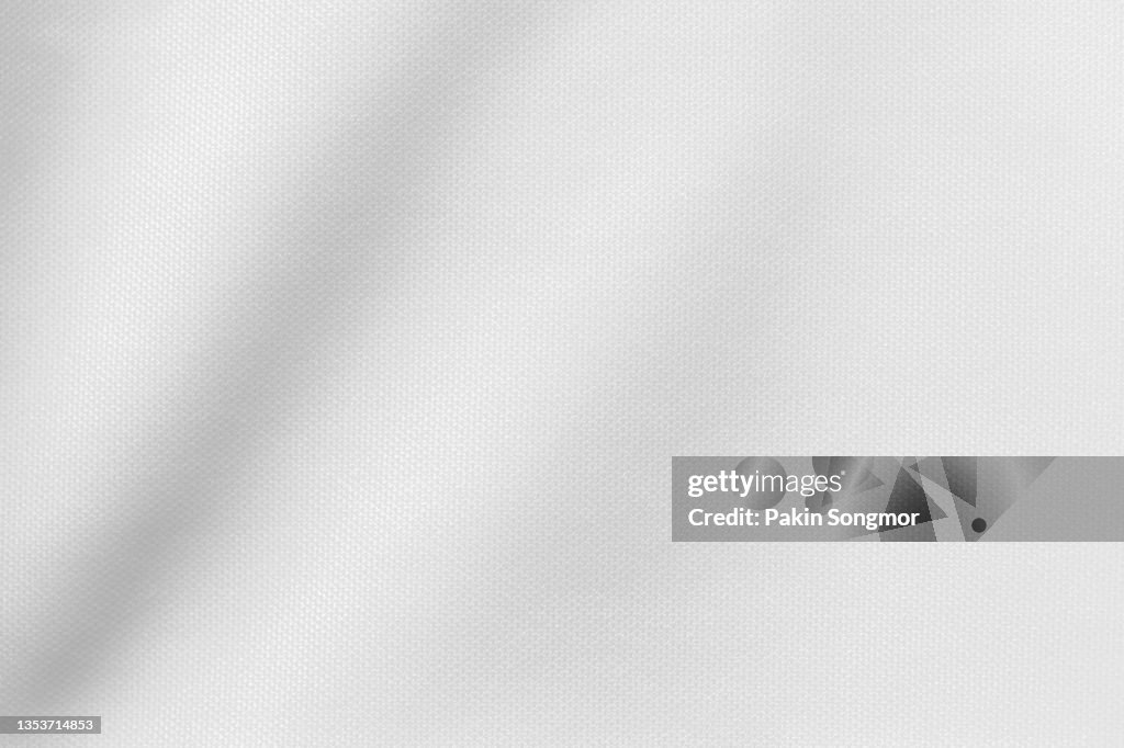 White color sports clothing fabric football shirt jersey texture and textile background.