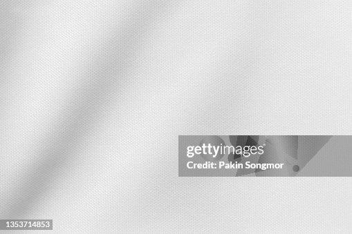 White color sports clothing fabric football shirt jersey texture and textile background. White color sports clothing fabric football shirt jersey texture and textile background.