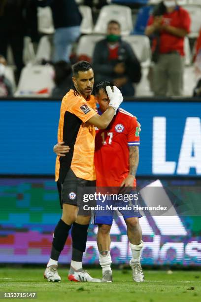 Claudio Bravo and Gary Medel of Chile react after a match between Chile and Ecuador as part of FIFA World Cup Qatar 2022 Qualifiers at San Carlos de...