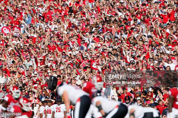 Oklahoma Sooners fans cheer against the Texas Tech Red Raiders in the second quarter at Gaylord Family Oklahoma Memorial Stadium on October 30, 2021...