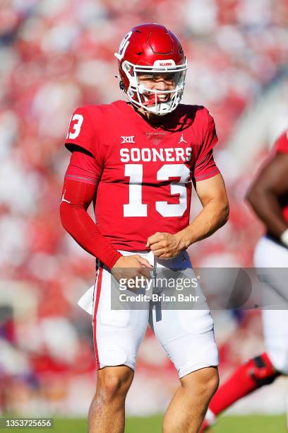 Quarterback Caleb Williams of the Oklahoma Sooner pumps his fists after a touchdown pass against the Texas Tech Red Raiders in the second quarter at...