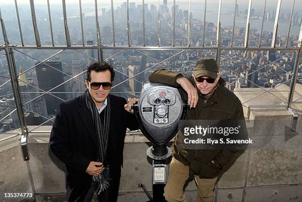 John Leguizamo and Ric O'Barry attend the The Empire State Building to raise awareness for the protection of dolphins in Japan on December 9, 2011 in...