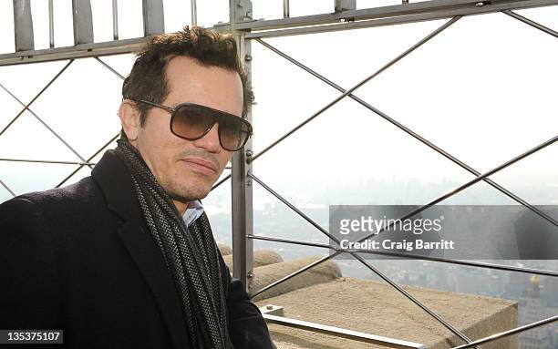 John Leguizamo lights the The Empire State Building to raise awareness for the protection of dolphins in Japan on December 9, 2011 in New York City.