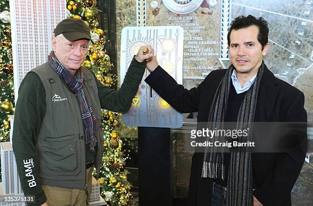 John Leguizamo and Ric O'Barry light the The Empire State Building to raise awareness for the protection of dolphins in Japan on December 9, 2011 in...