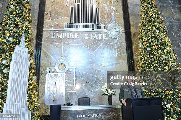 Atmosphere at lighting of the The Empire State Building to raise awareness for the protection of dolphins in Japan on December 9, 2011 in New York...