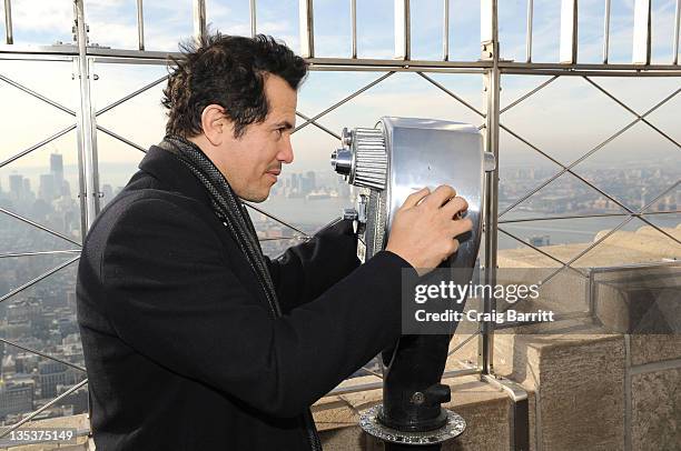 John Leguizamo lights the The Empire State Building to raise awareness for the protection of dolphins in Japan on December 9, 2011 in New York City.