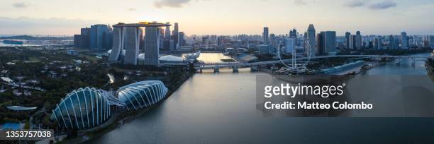 singapore sunset panoramic - singapore city aerial stock pictures, royalty-free photos & images