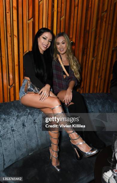 Amber Scholl and Lauren Riihimaki attend Leroy Sanchez's Album Release Party at The Peppermint Club on November 16, 2021 in Los Angeles, California.