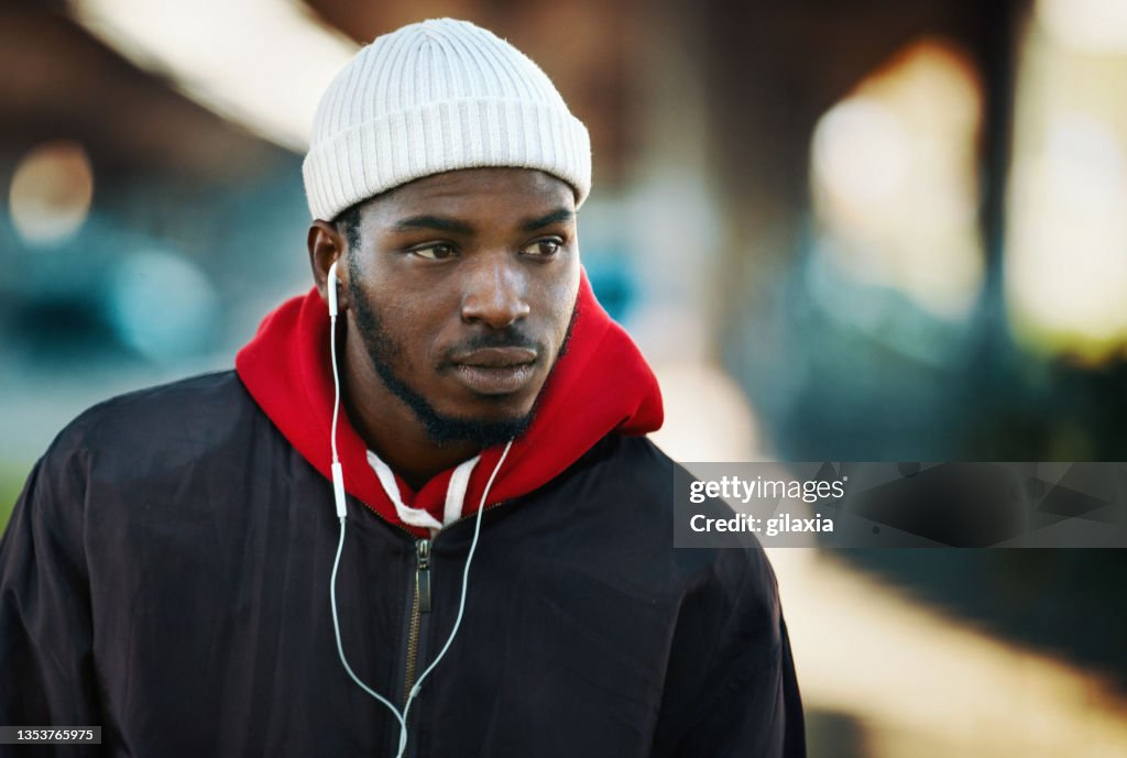 Street portrait of a young African American man.