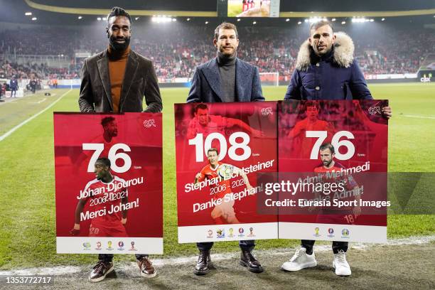 Johan Djourou , Stephan Lichtsteiner and Admir Mehmedi pose for photos before the 2022 FIFA World Cup Qualifier match between Switzerland and...