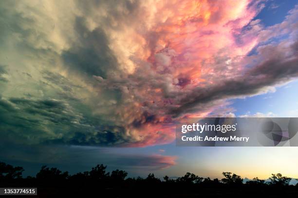 storm clouds at sunset, rural farm, australia - monsoon stock pictures, royalty-free photos & images