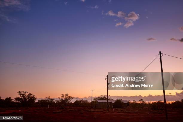 sunrise in rural australia, telegraph pole, power cable, - rural australia stock pictures, royalty-free photos & images