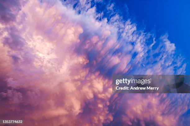 surreal science fiction fantasy cloudscape, purple blue sky - atmosphere clouds stock pictures, royalty-free photos & images