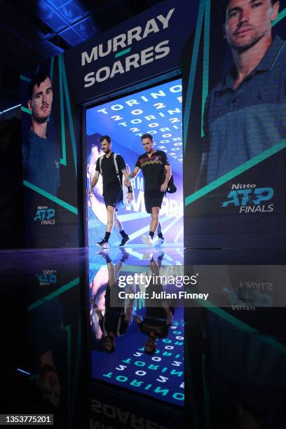 Jamie Murray of Great Britain and Bruno Soares of Brazil walk out prior to their doubles match against Robert Farah and Juan Sebastián Cabal of...