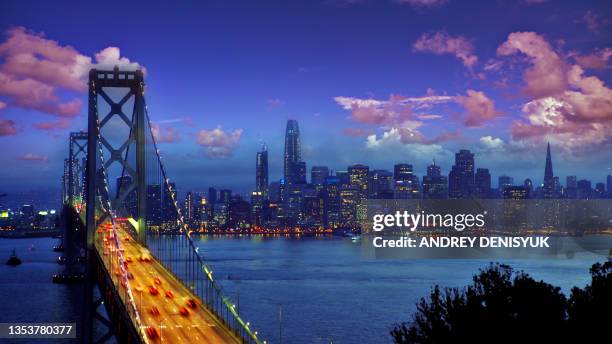 san francisco – oakland bay bridge and financial district. - san fransisco stock pictures, royalty-free photos & images