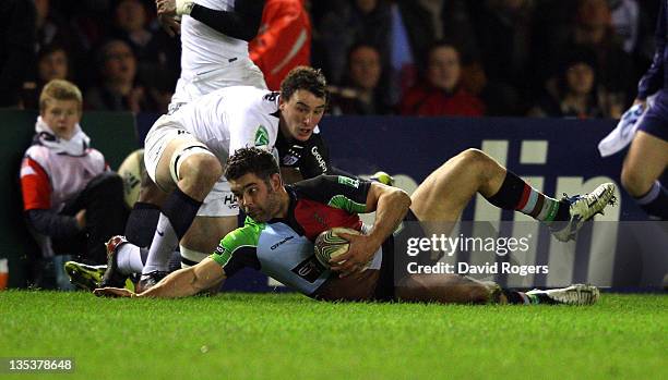 Nick Easter of Harlequins falls onto the loose ball during the Heineken Cup match between Harlequins and Toulouse at Twickenham Stoop on December 9,...