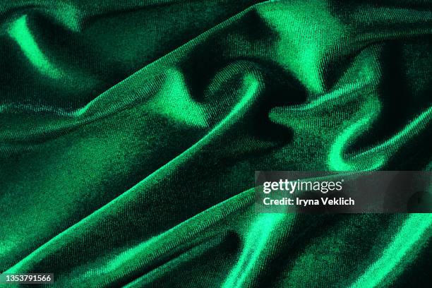 concept of trendy background  for christmas and new year holiday with green velvet fabric. - veludo material têxtil - fotografias e filmes do acervo