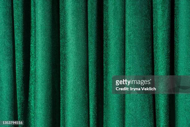 concept of trendy background  for christmas and new year holiday  with green velvet curtains. - window treatment stock pictures, royalty-free photos & images