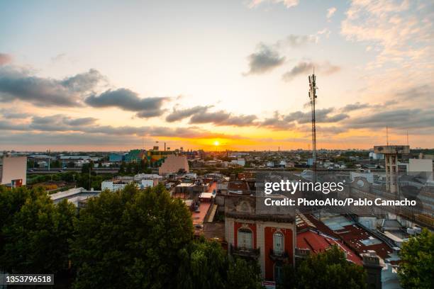 view of cityscape with residential buildings and industrial buildings in buenos aires - buenos aires rooftop stockfoto's en -beelden