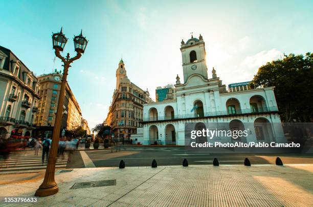 low angle view of exterior of cabildo of buenos aires with pedestrian crossing street - argentina skyline stock pictures, royalty-free photos & images