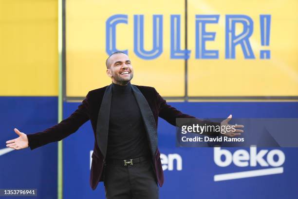 Dani Alves reacts as he is presented as a FC Barcelona player at Camp Nou on November 17, 2021 in Barcelona, Spain.